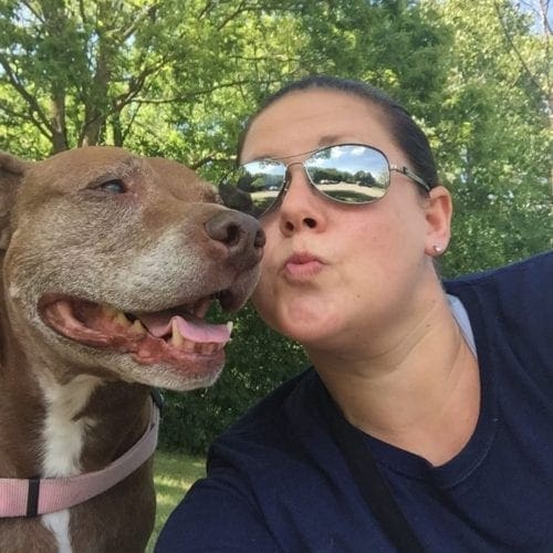 Dog trainer Kristie Halverson and her first pitbull Nala